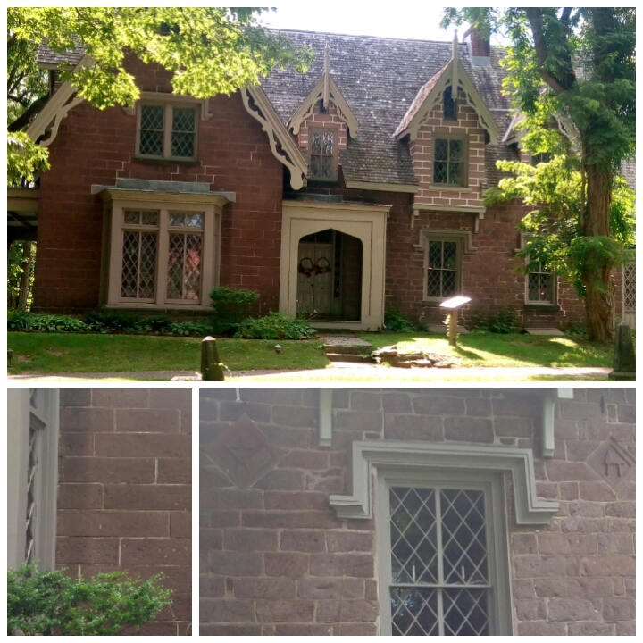 The Gothic revival refers to the Medieval churches of Europe as the house is constructed with diamond windows, columns, peaked roofs, arched door entrances, high chimneys. The walls on the left are after the renovation. Thus, the bricks used in them are structured properly. While, the ones on the right, are the ones constructed by secret society as it has masonic symbols, building tools in particular, like the hammer and others, constructed over the bricks.